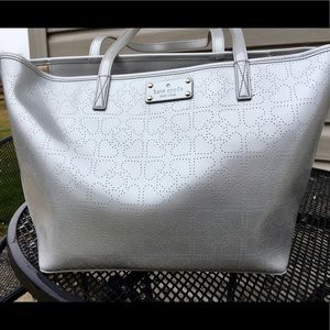 a silver/ grey kate spade tote purse
